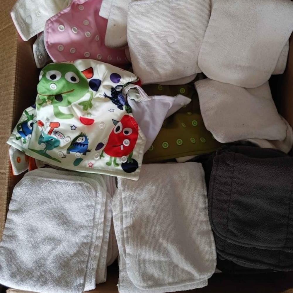 Pocket cloth diapers and inserts